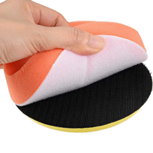 A side view of a 7-inch/180mm car polishing sponge wheel attached to a rotary tool, ready for use on a car's surface.